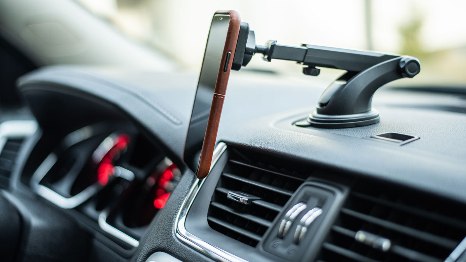 Dash Pro Magno Mount version 3 set up in a car with phone mounted